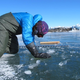 A researcher working on a slushy section of the McMurdo ice shelf.